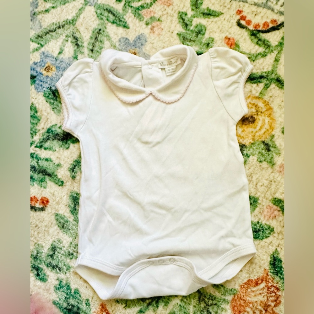 Kissy kissy Peter Pan onesie